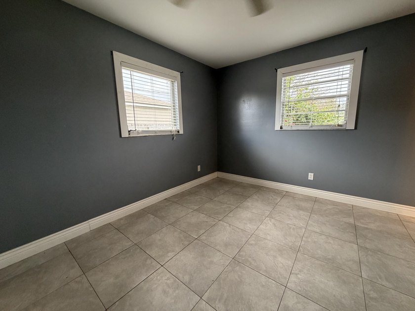 Check out this charming 2 bed, 2 bath home with many unique - photo 4