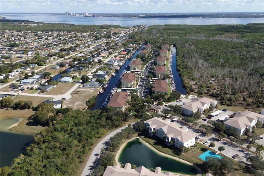 SPACIOUS TOP FLOOR CONDO WITH WATER VIEW, GREAT AMENITIES AND - photo 2