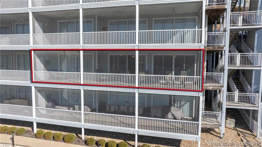 Huge screened deck, 12x32 boat slip with 8,000 lb lift, and rare - photo 37