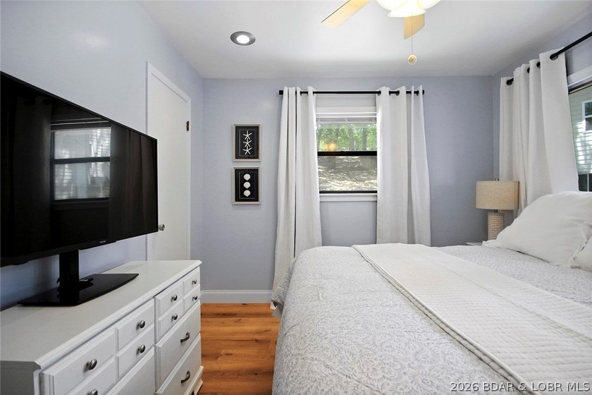 Enjoy unbeatable lake views from this beautifully updated - photo 25