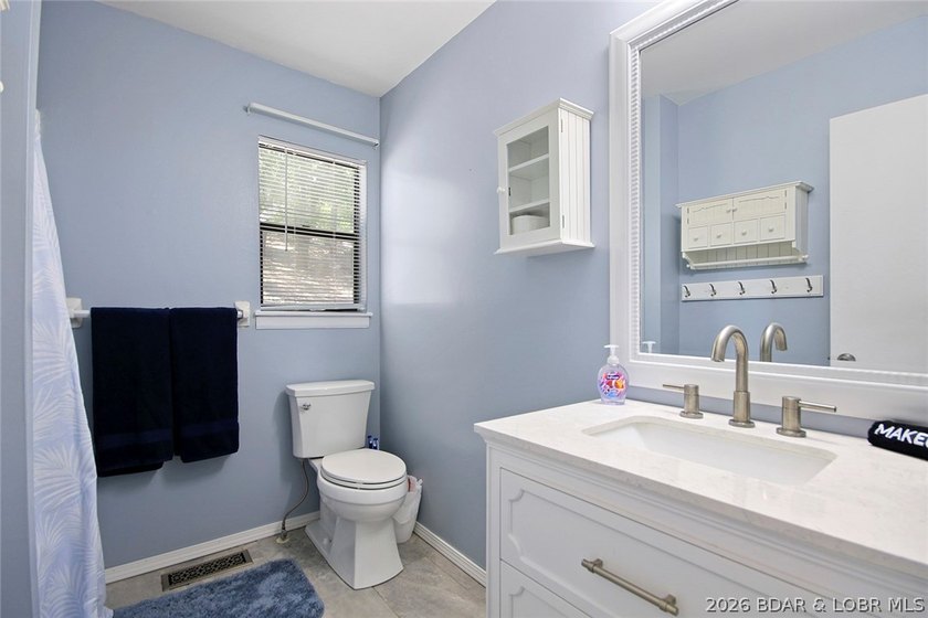 Enjoy unbeatable lake views from this beautifully updated - photo 31