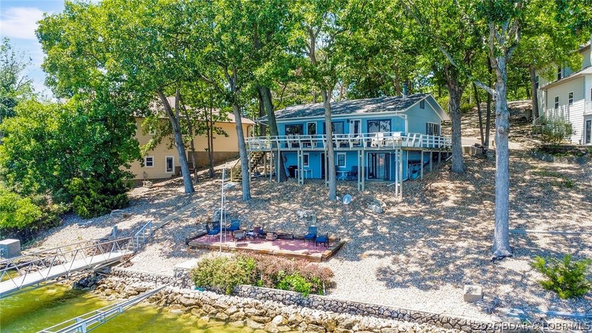 Enjoy unbeatable lake views from this beautifully updated - photo 48