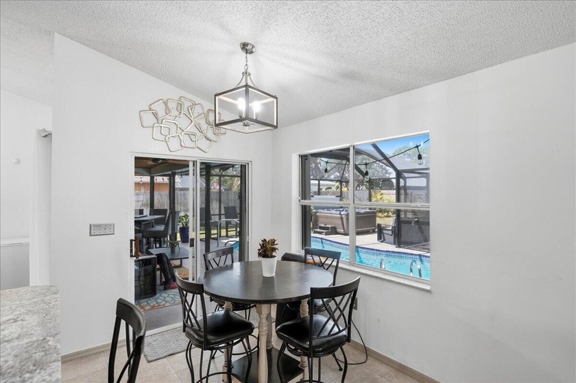 Welcome home to this beautifully updated 3-bedroom, 2-bath pool - photo 16