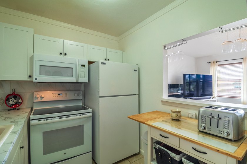 Retirement is a breeze in this charming 1-bedroom, 1.5-bathroom - photo 14