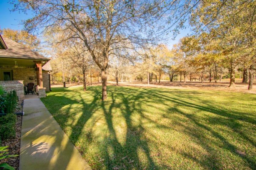 CUSTOM BUILT HOME ON GOLF COURSE WITH ACREAGE SOLD - photo 4