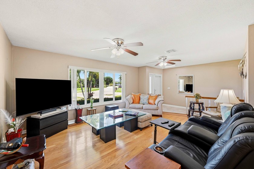 This well-maintained 3-bed, 2-bath CBS pool home sits on one of - photo 8