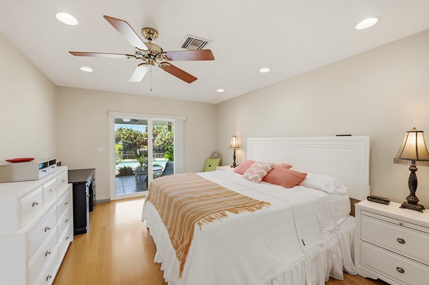 This well-maintained 3-bed, 2-bath CBS pool home sits on one of - photo 10
