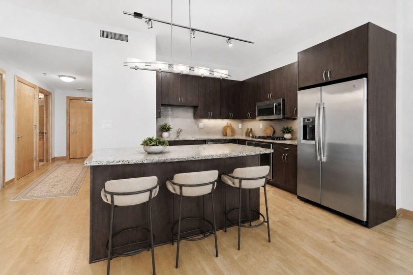 Modern Mill District Condo with a spacious floorplan flooded - photo 2