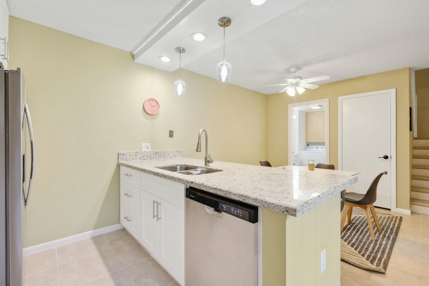 Located in the Village of Sandalwood Lakes South , this newly - photo 8