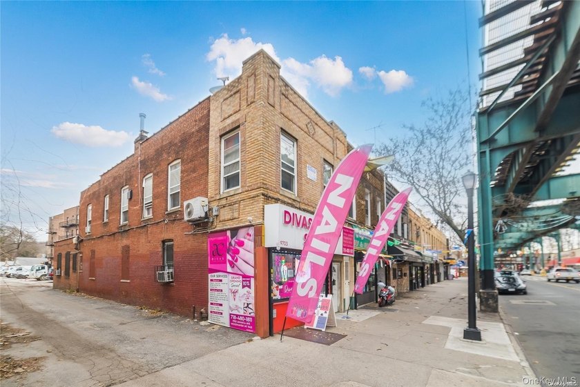 Welcome to 9703 Jamaica Ave, a mixed-use building featuring one - photo 2