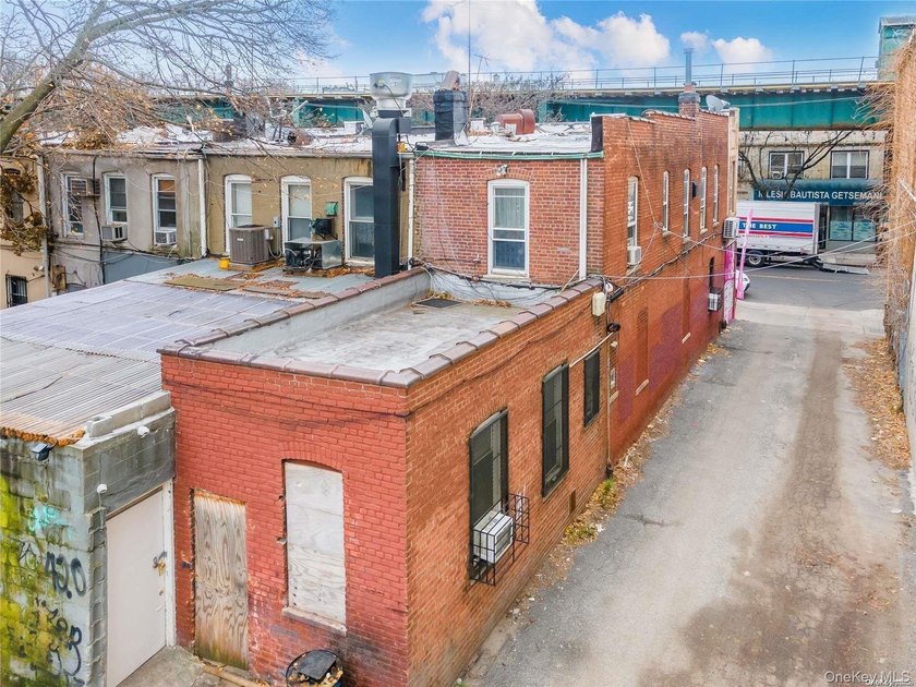 Welcome to 9703 Jamaica Ave, a mixed-use building featuring one - photo 3