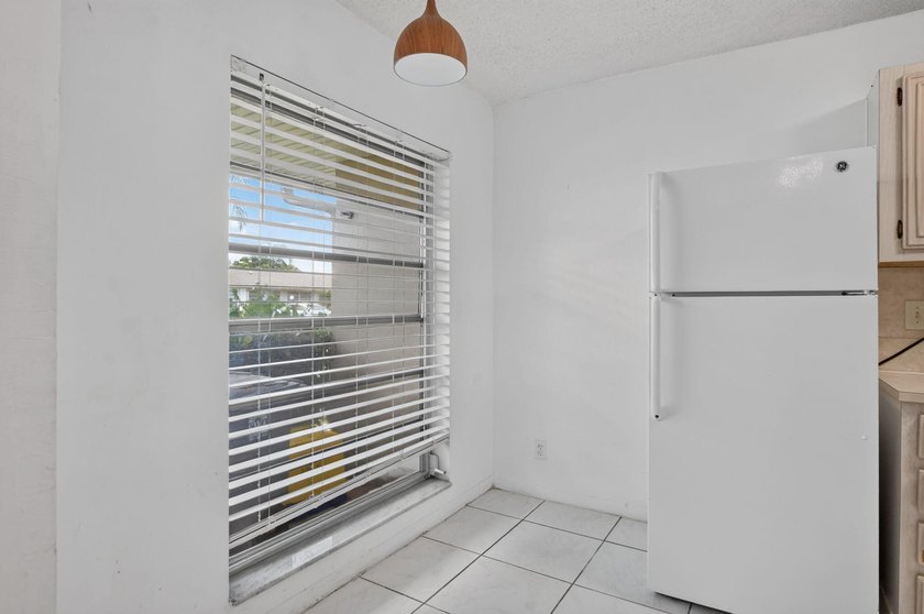 Welcome to Boca Lakes, a 55+ gated community in the heart of - photo 7