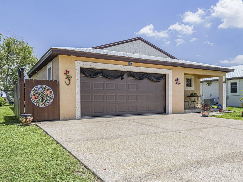 Located in the desirable Spanish Lakes community, this - photo 2