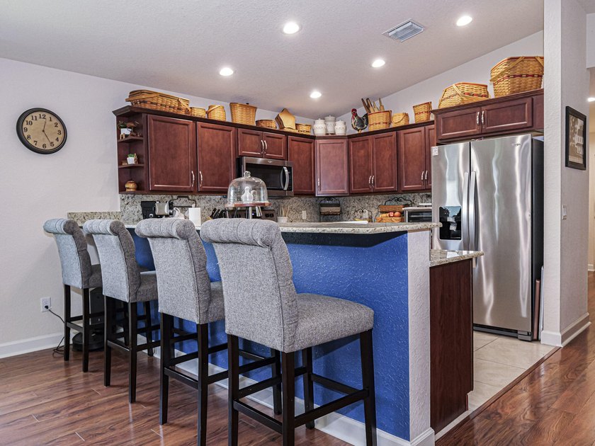 Located in the desirable Spanish Lakes community, this - photo 10