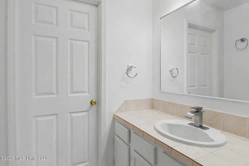 Pristine and move-in ready in the heart of Long Beach! Pride of - photo 11