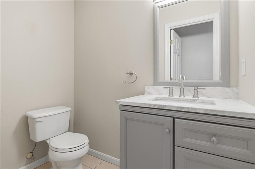 Welcome to this well-maintained 2-bedroom, 1.5-bath condominium - photo 13