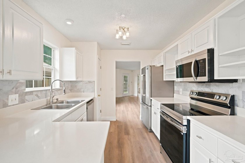 Nestled in the desirable Belle Chasse community, this 3 bedroom - photo 11