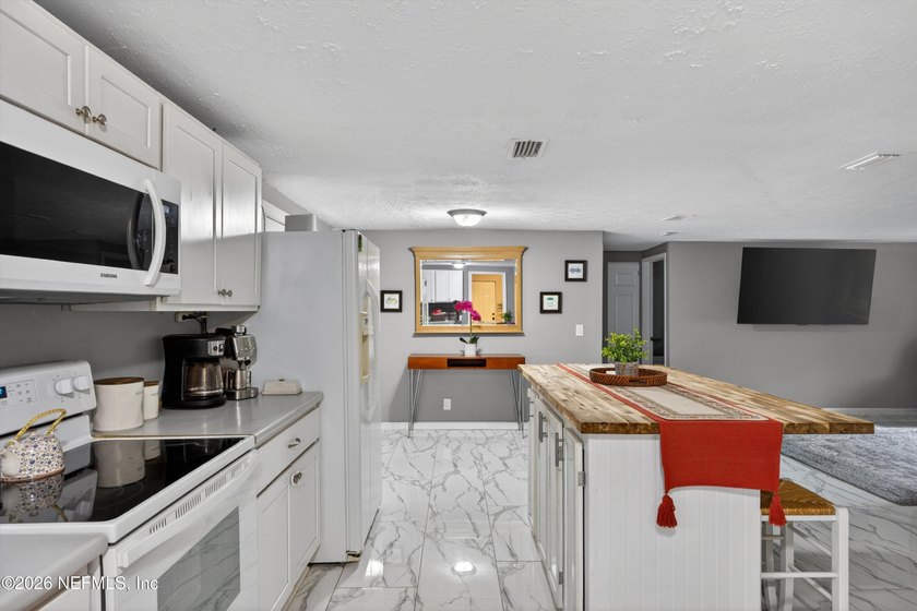 Welcome to this Charming 4-bedroom, 2-full bath home in the - photo 3