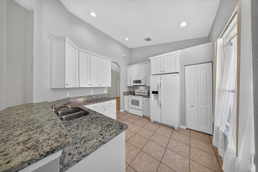 This 3BD/2BA CBS home is located in the gated community of - photo 15