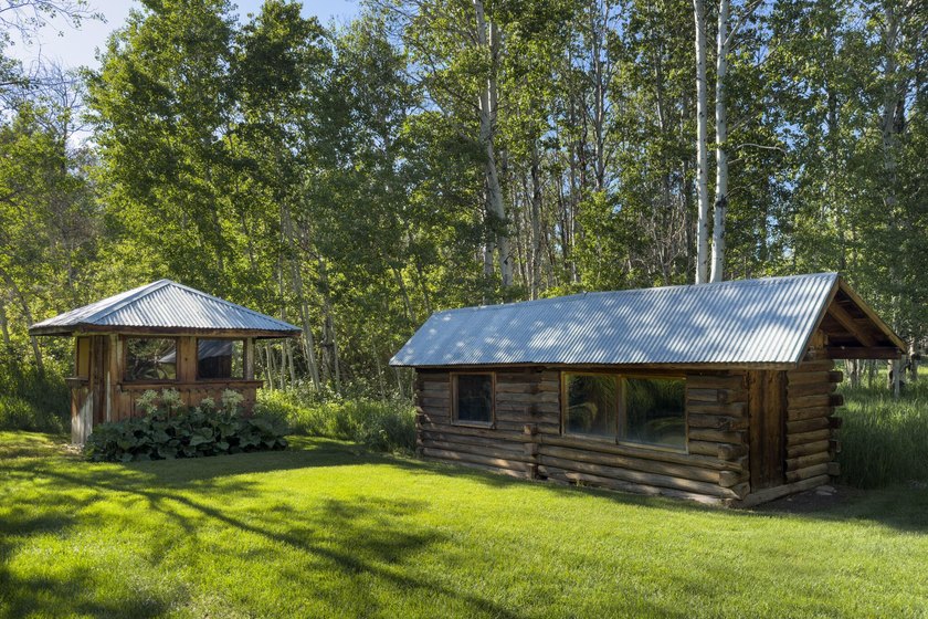 This property spans 7 acres over 3 parcels and hold deep - photo 41
