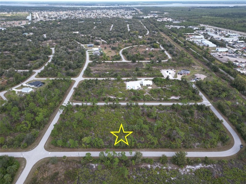 Vacant lot for sale in a growing area near Englewood. Build your - photo 3