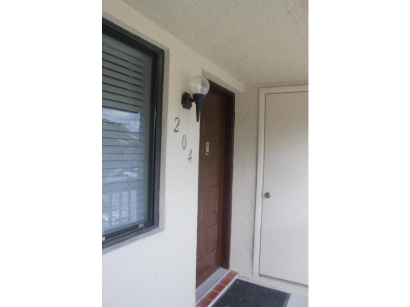 Welcome to this 2-bedroom, 2-bathroom waterfront condominium in - photo 2