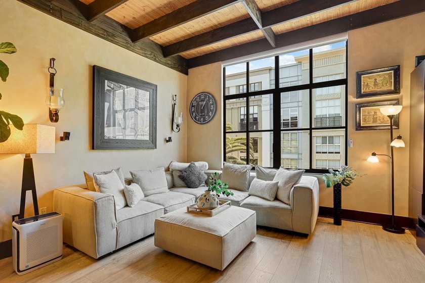 This meticulously remodeled loft captures the essence of the - photo 2