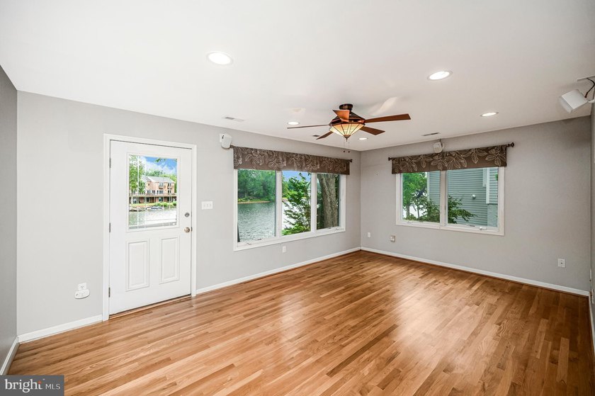 Nestled in a peaceful cove with stunning main lake views and - photo 13