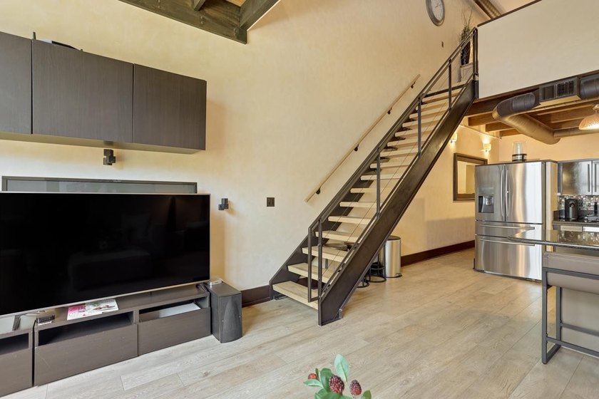 This meticulously remodeled loft captures the essence of the - photo 5