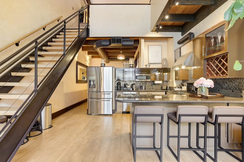This meticulously remodeled loft captures the essence of the - photo 7