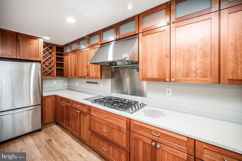 Nestled in a peaceful cove with stunning main lake views and - photo 17