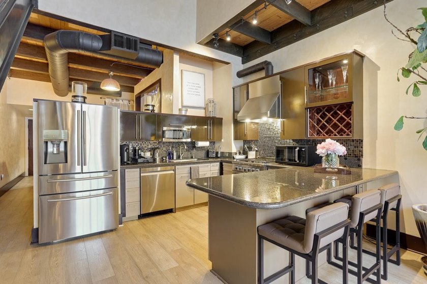 This meticulously remodeled loft captures the essence of the - photo 8