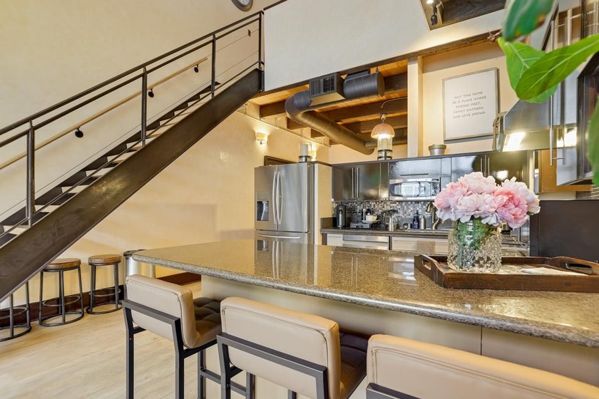 This meticulously remodeled loft captures the essence of the - photo 9