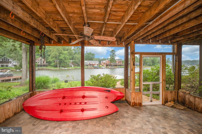 Nestled in a peaceful cove with stunning main lake views and - photo 36