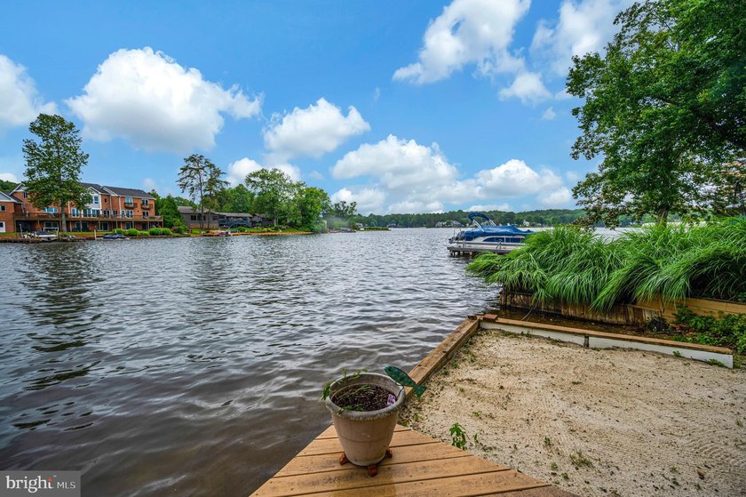 Nestled in a peaceful cove with stunning main lake views and - photo 42