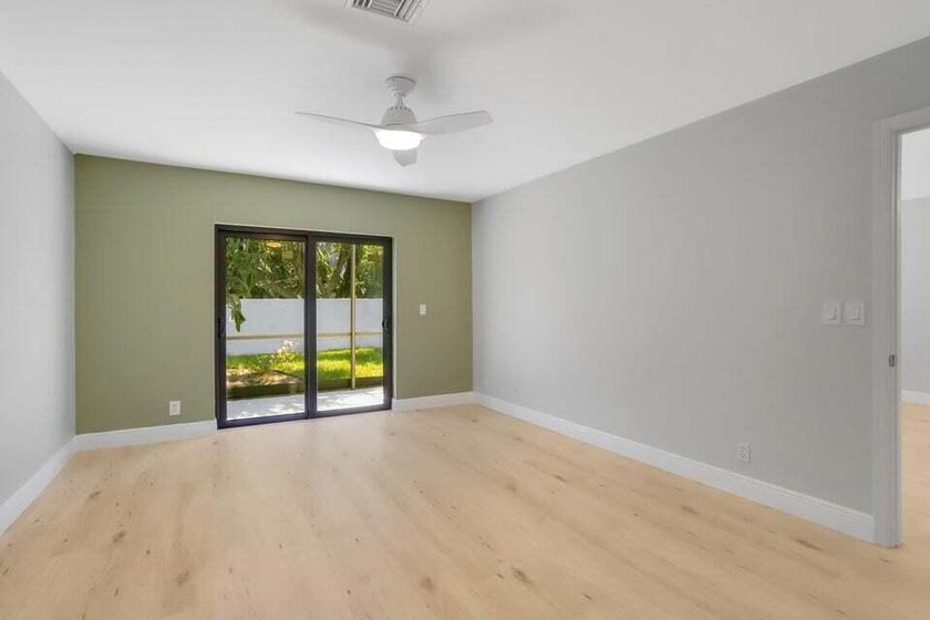 Make this beautifully remodeled 2-bedroom, 2-bath villa in - photo 11