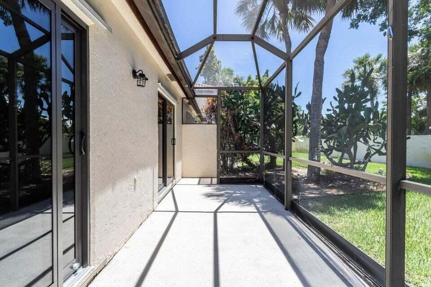 Make this beautifully remodeled 2-bedroom, 2-bath villa in - photo 15