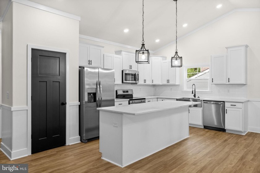 Nestled in the serene Lake of the Woods community, this stunning - photo 17