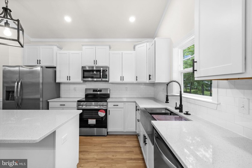 Nestled in the serene Lake of the Woods community, this stunning - photo 23