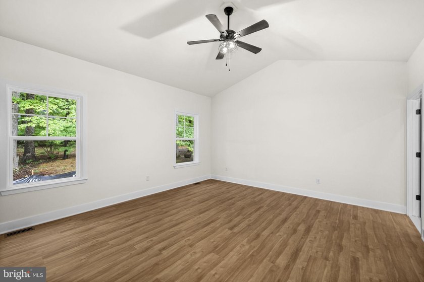 Nestled in the serene Lake of the Woods community, this stunning - photo 29