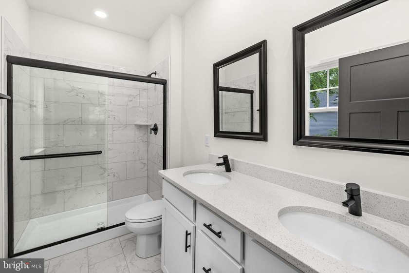 Nestled in the serene Lake of the Woods community, this stunning - photo 32