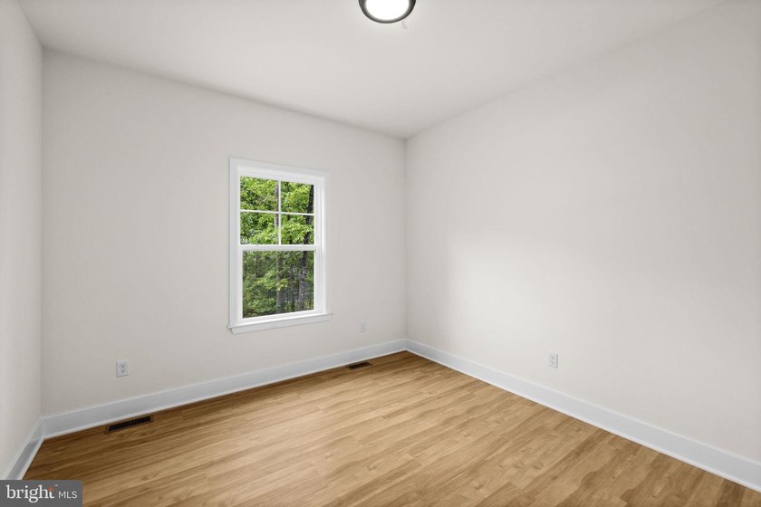 Nestled in the serene Lake of the Woods community, this stunning - photo 35