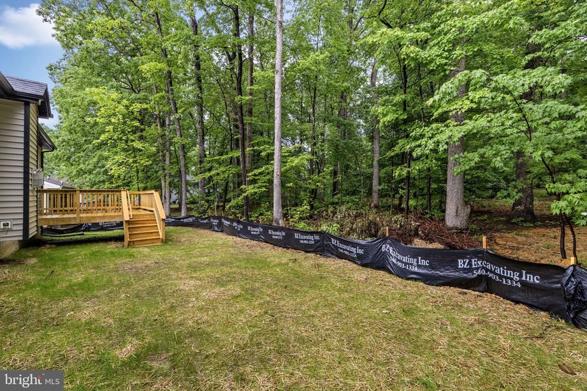 Nestled in the serene Lake of the Woods community, this stunning - photo 41