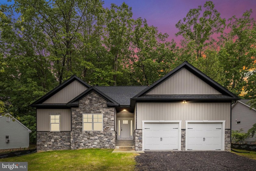 Nestled in the serene Lake of the Woods community, this stunning - photo 42