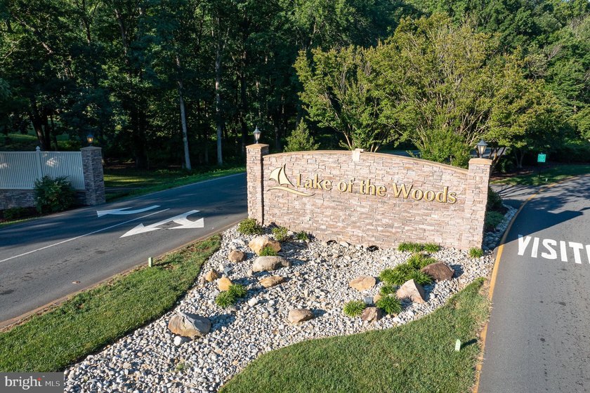 Nestled in the serene Lake of the Woods community, this stunning - photo 43
