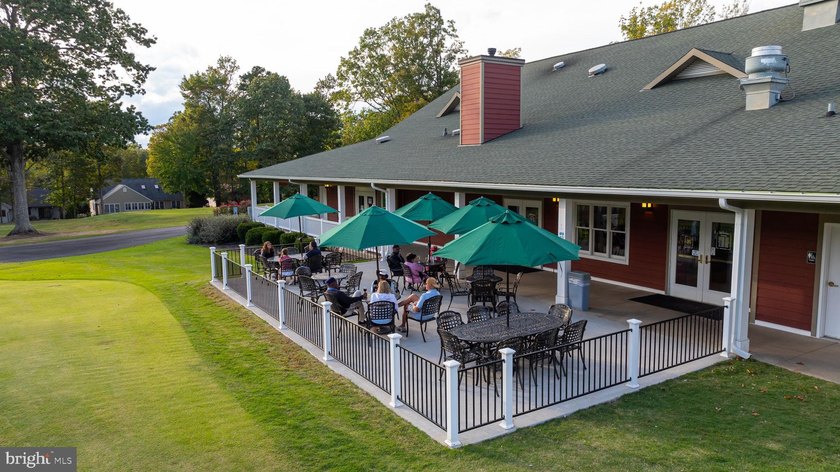 Nestled in the serene Lake of the Woods community, this stunning - photo 50