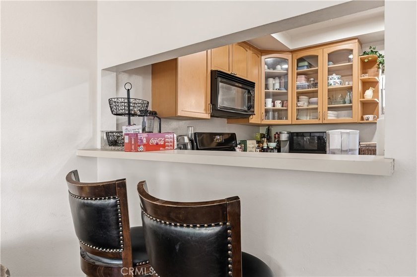 Just two short blocks from the sand, this inviting coastal condo - photo 11