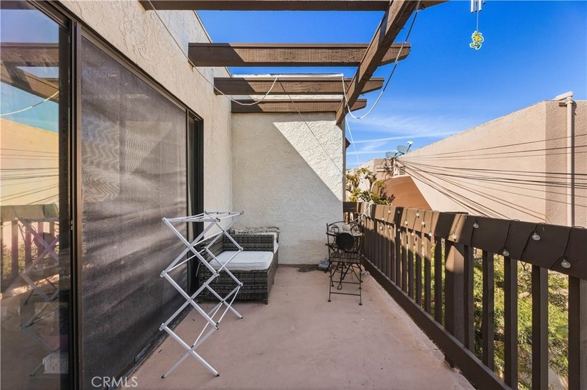 Just two short blocks from the sand, this inviting coastal condo - photo 22