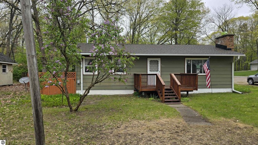 Located just minutes away from the beautiful waters of Fife Lake - photo 2