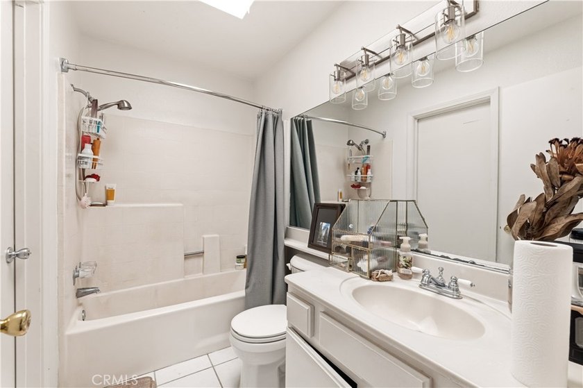 Just two short blocks from the sand, this inviting coastal condo - photo 26